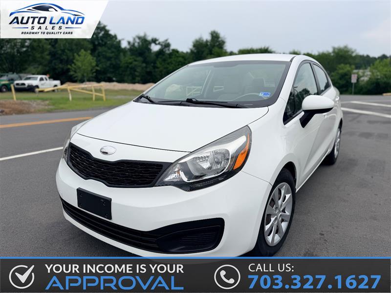 Clear White 2013 Kia Rio Sedan Front-Wheel Drive Automatic
