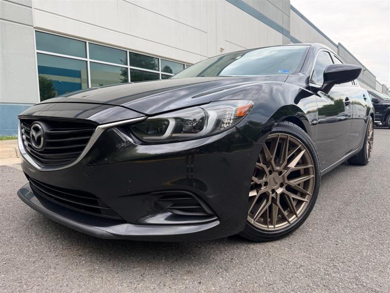2014 Mazda EZ-6 i Touring Auto's photo