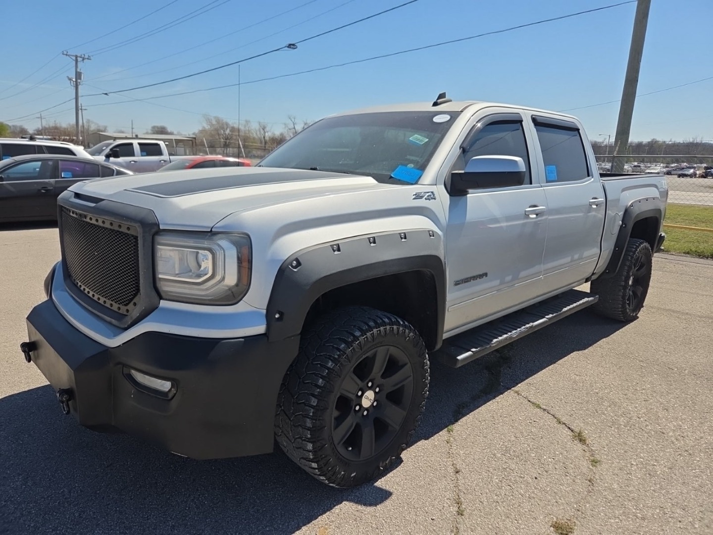 2016 GMC Sierra 4WD Crew Cab Short Box SLE's photo