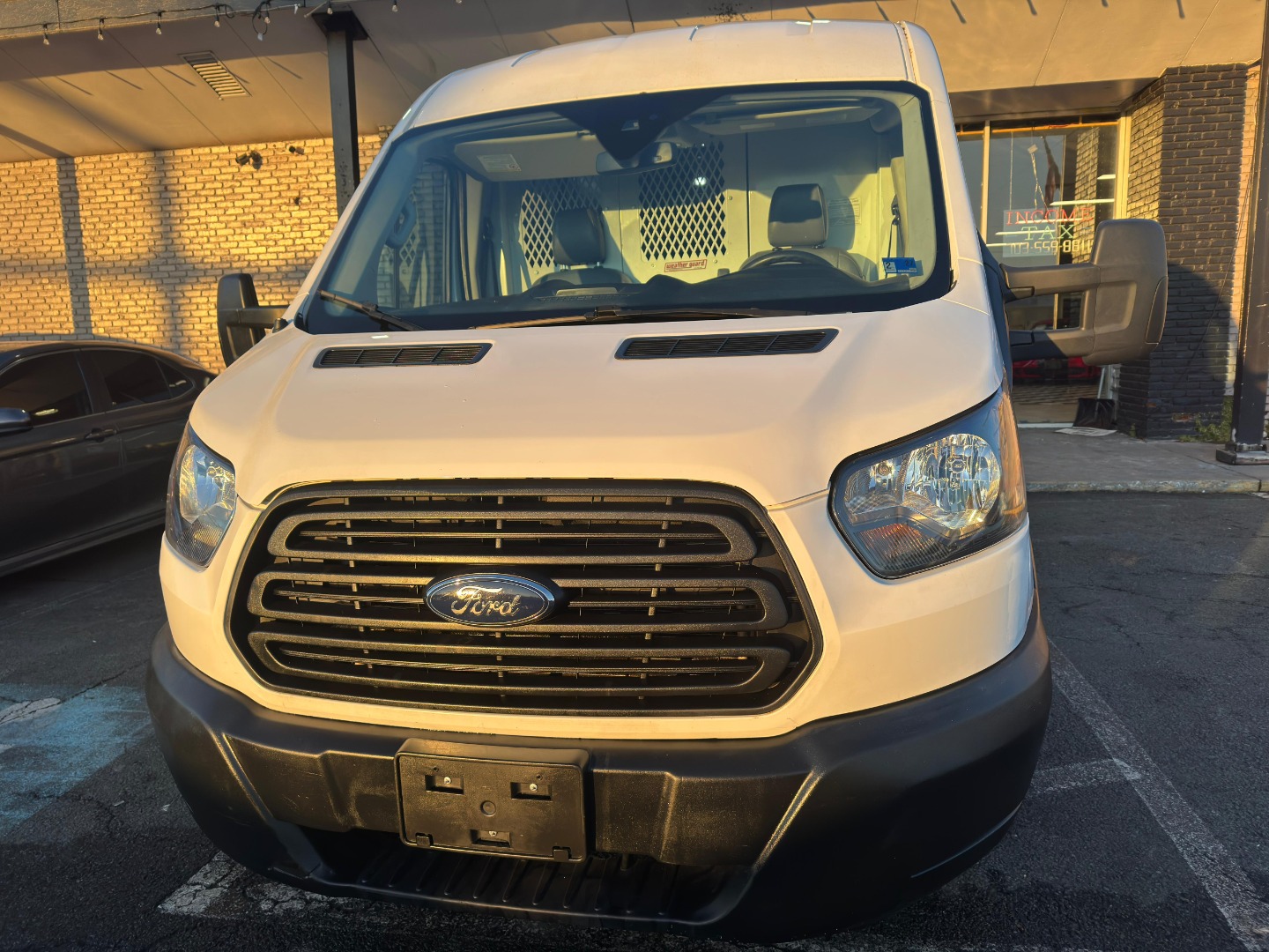 2019 Ford Transit 350 Med Roof Sliding Pass. 148 WB's photo