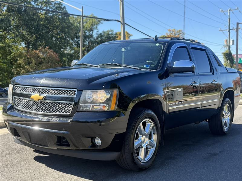 Black 2013 Chevrolet Avalanche Pickup Truck Four-Wheel Drive Automatic