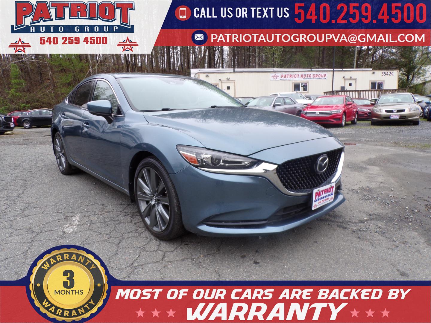2018 Mazda EZ-6 Touring Auto's photo