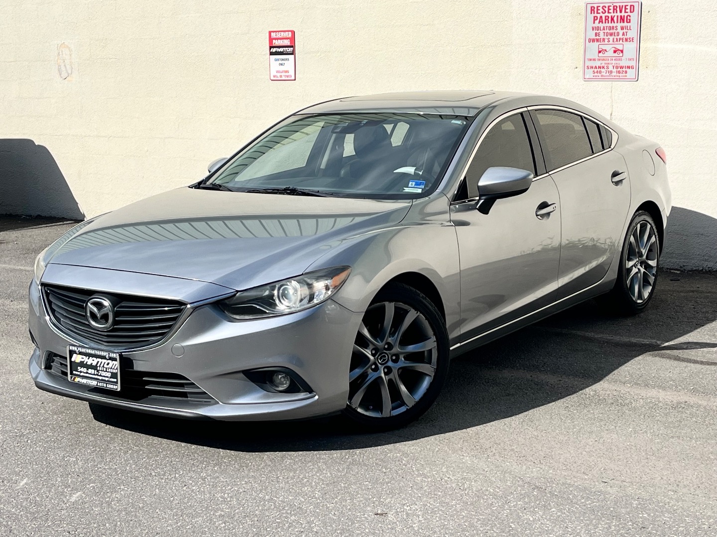 2015 Mazda EZ-6 i Grand Touring Auto's photo